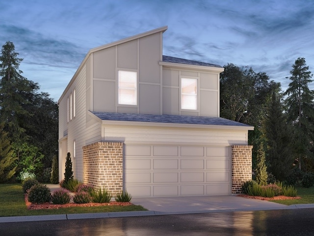 view of front of property with a garage