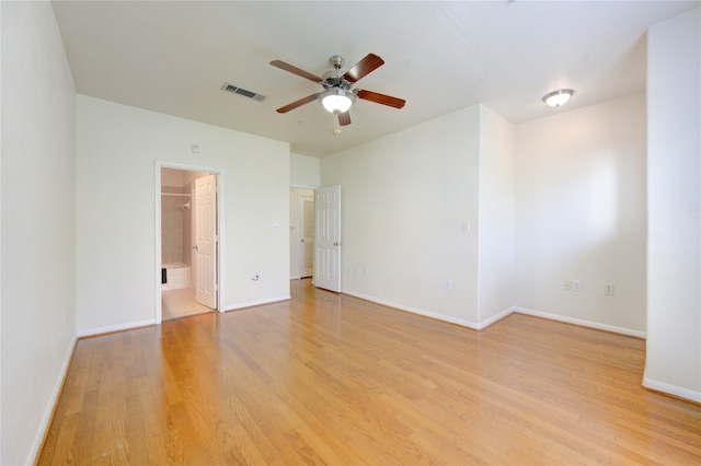 unfurnished room featuring ceiling fan and light hardwood / wood-style flooring