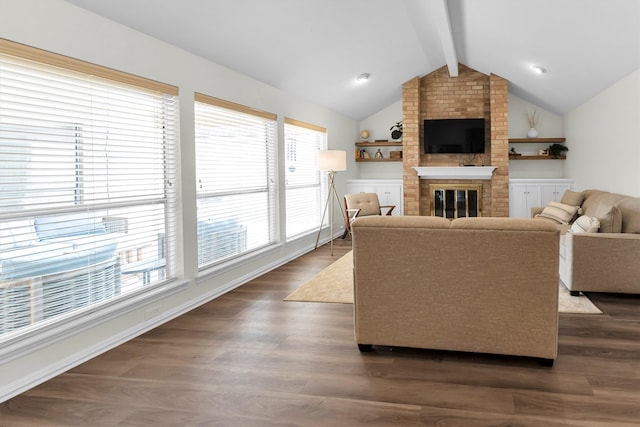 living room featuring a fireplace, vaulted ceiling with beams, and dark hardwood / wood-style floors