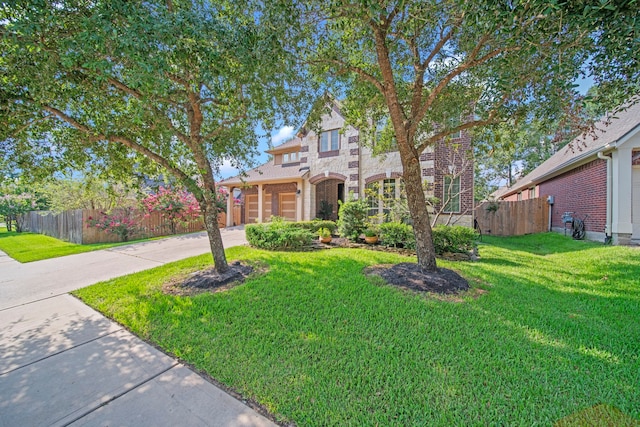 view of front of home with a front lawn