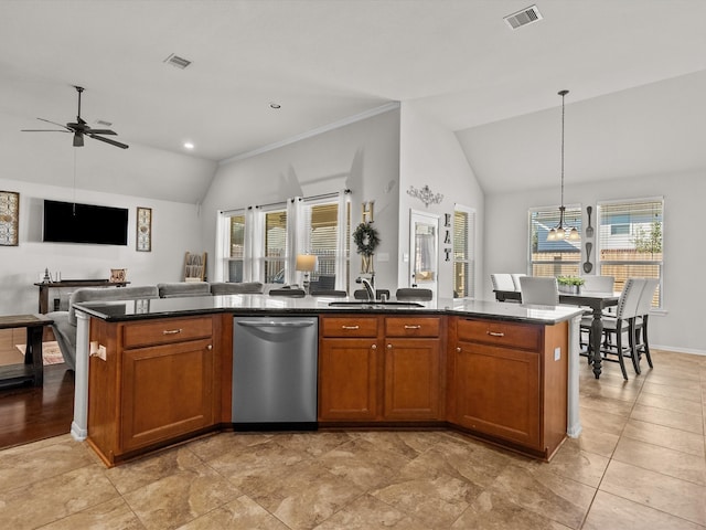 kitchen with ceiling fan, sink, dishwasher, hanging light fixtures, and an island with sink