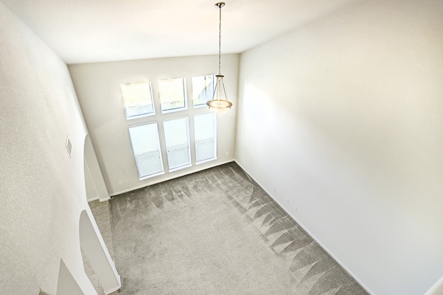 unfurnished dining area with carpet flooring