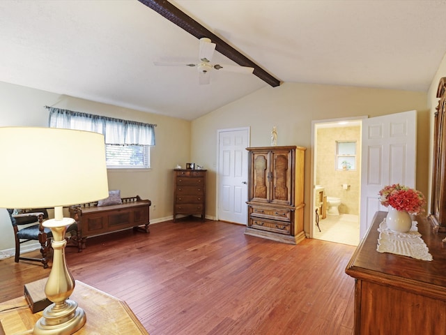 sitting room featuring ceiling fan, lofted ceiling with beams, and hardwood / wood-style floors