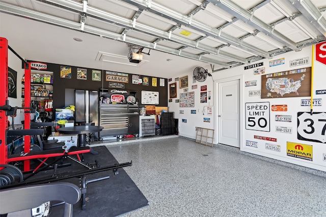 garage featuring a garage door opener