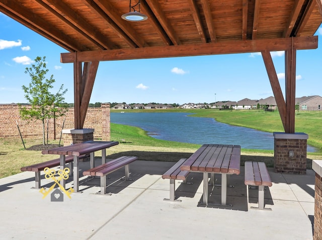 view of patio / terrace featuring a water view