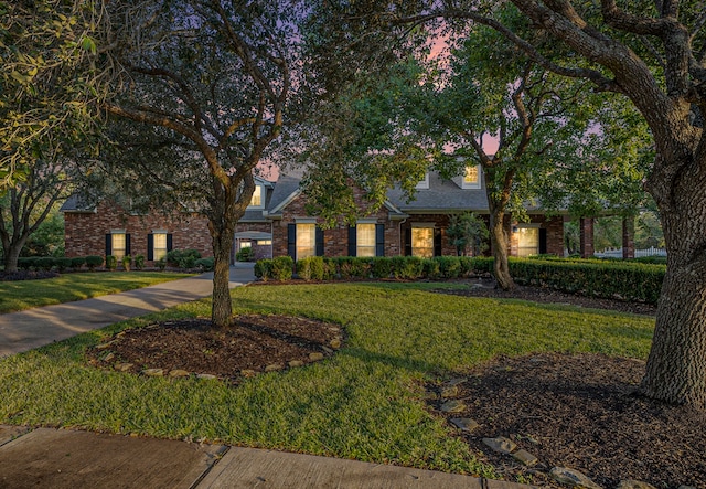 view of front of house with a front lawn