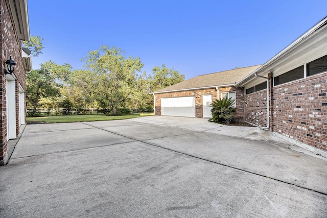 garage with a yard