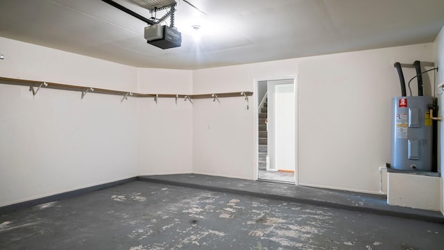 2038 Adobe Stone Dr, Humble, TX 77396 - garage with baseboards, electric water heater, and a garage door opener