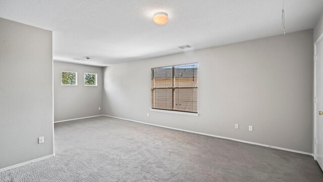 2038 Adobe Stone Dr, Humble, TX 77396 - carpeted spare room with visible vents and baseboards