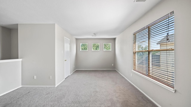 2038 Adobe Stone Dr, Humble, TX 77396 - empty room with carpet flooring, visible vents, and baseboards