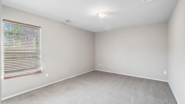 2038 Adobe Stone Dr, Humble, TX 77396 - carpeted empty room featuring baseboards and visible vents