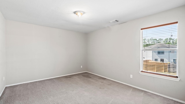2038 Adobe Stone Dr, Humble, TX 77396 - empty room featuring baseboards, visible vents, and carpet floors