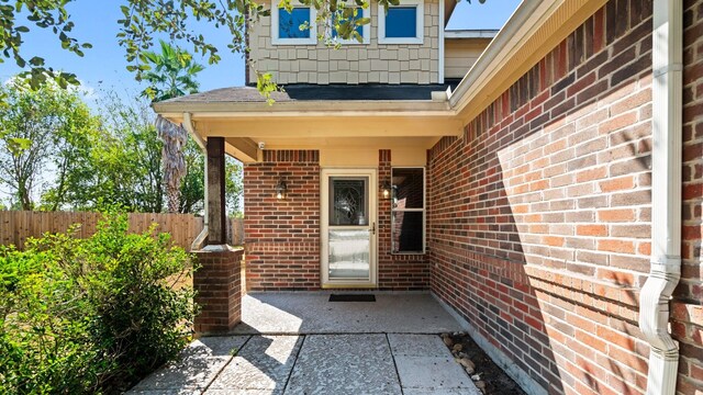 2038 Adobe Stone Dr, Humble, TX 77396 - property entrance featuring brick siding and fence