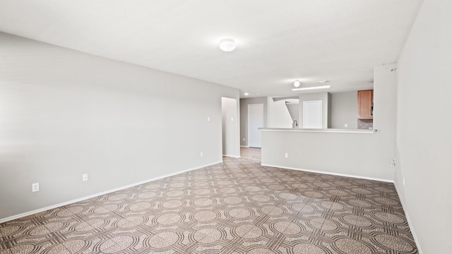 2038 Adobe Stone Dr, Humble, TX 77396 - unfurnished living room with baseboards