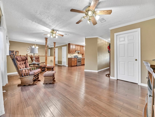 living room featuring crown molding, wood-type flooring, a textured ceiling, and ceiling fan with notable chandelier