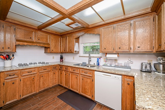 kitchen with sink, decorative backsplash, white appliances, and dark hardwood / wood-style flooring