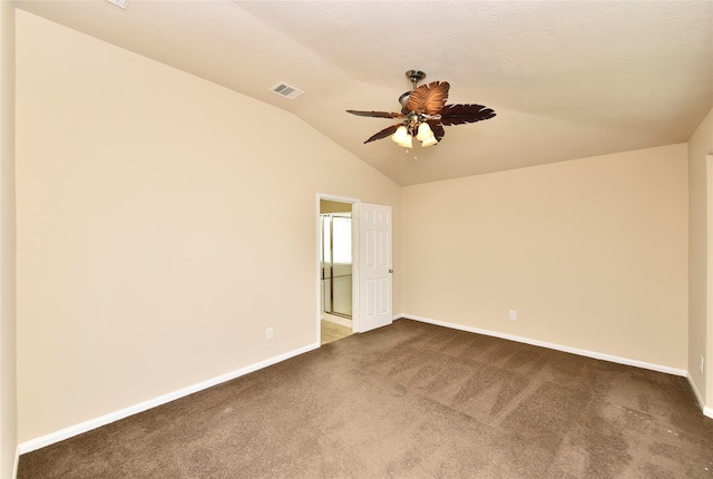 carpeted empty room with lofted ceiling and ceiling fan