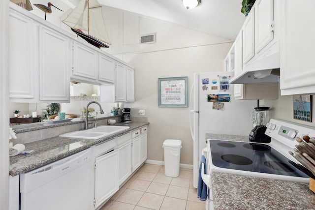 kitchen with light tile patterned flooring, sink, white dishwasher, stove, and white cabinets