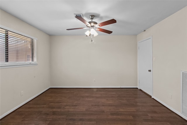 unfurnished room featuring dark hardwood / wood-style floors and ceiling fan