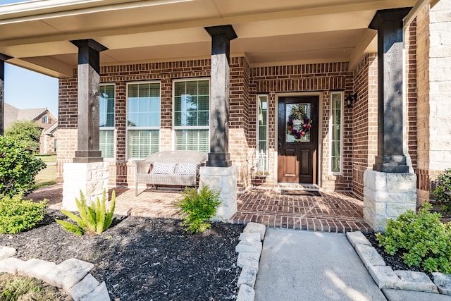 entrance to property with a porch