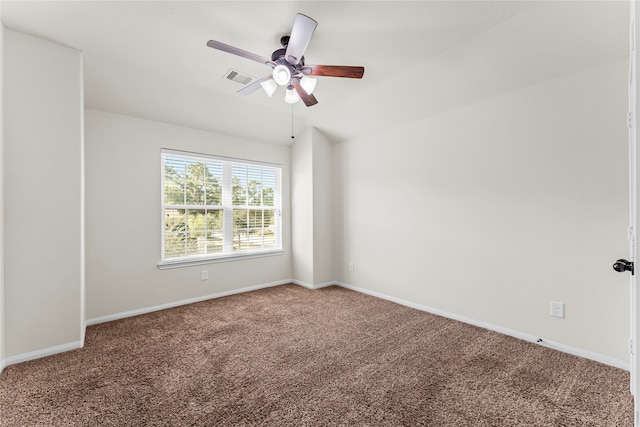 empty room with carpet and ceiling fan