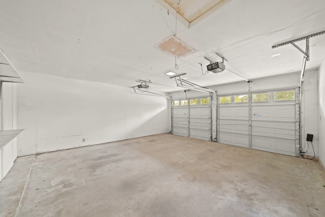 garage featuring a garage door opener