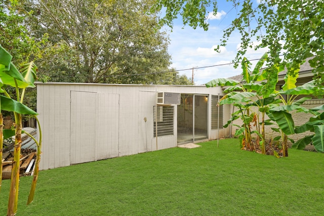 view of outdoor structure featuring a yard