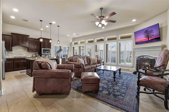 living room featuring ceiling fan