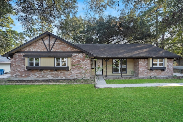 ranch-style home with a front lawn