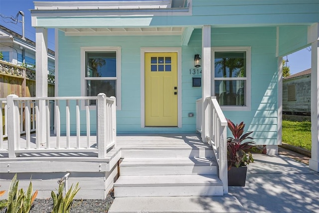 doorway to property with a porch