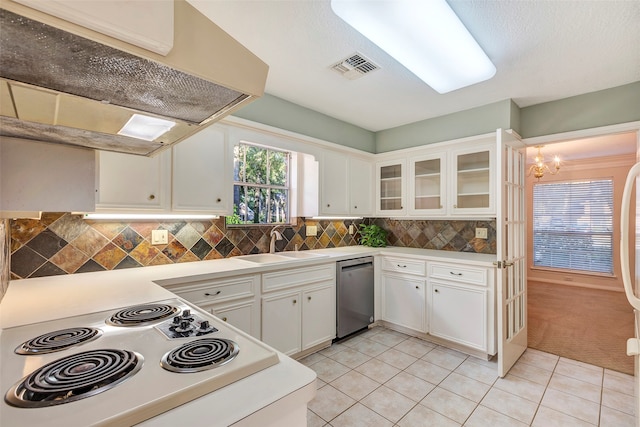 kitchen featuring light tile patterned flooring, dishwasher, white range, sink, and white cabinetry