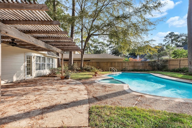 view of swimming pool featuring a patio and a pergola