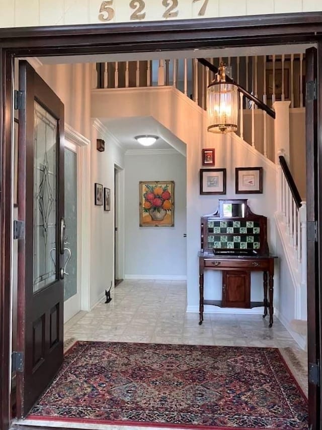 foyer entrance with crown molding