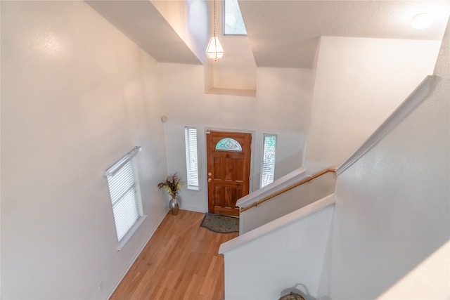 entrance foyer with light hardwood / wood-style floors