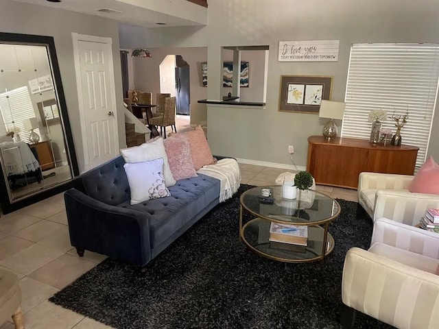 living room featuring light tile patterned flooring