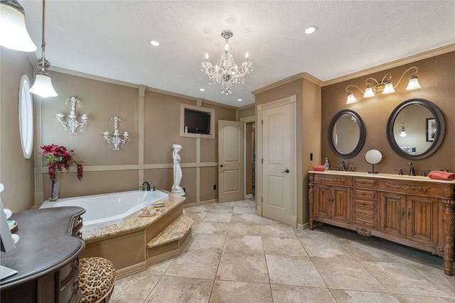 bathroom with a garden tub, double vanity, ornamental molding, and a sink