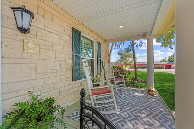 view of patio featuring a porch