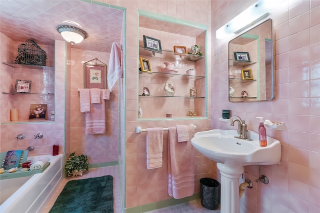 bathroom featuring backsplash and tile walls