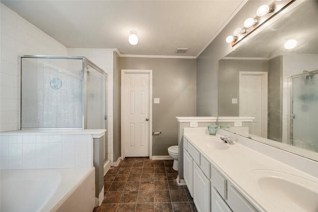 full bathroom featuring vanity, toilet, and separate shower and tub