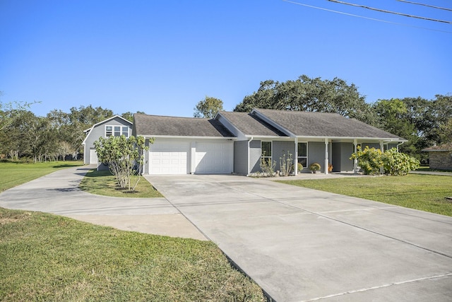 ranch-style home featuring a garage and a front yard