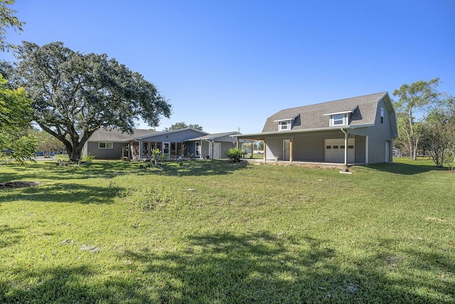 view of yard featuring a garage