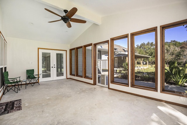 unfurnished sunroom featuring french doors, lofted ceiling with beams, and ceiling fan