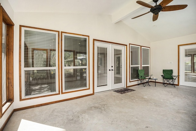 unfurnished sunroom featuring french doors, vaulted ceiling with beams, and ceiling fan