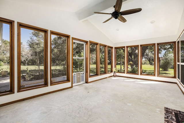 unfurnished sunroom featuring vaulted ceiling with beams and ceiling fan