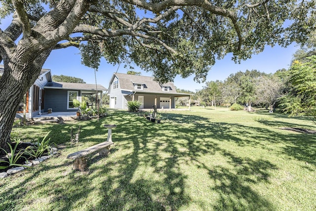 view of yard with a garage