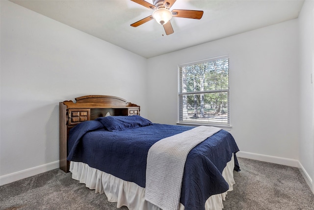 bedroom with dark carpet and ceiling fan