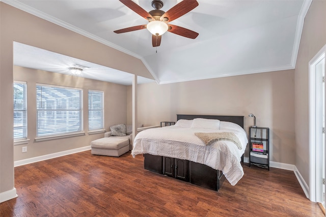 bedroom with crown molding, dark hardwood / wood-style floors, and ceiling fan