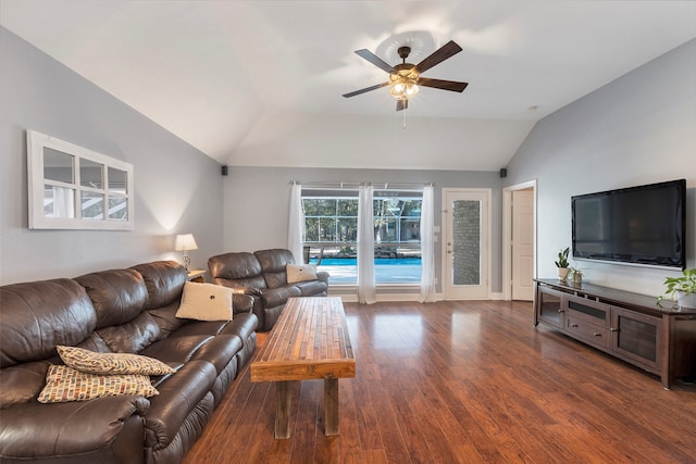 living room with vaulted ceiling, dark hardwood / wood-style floors, and ceiling fan