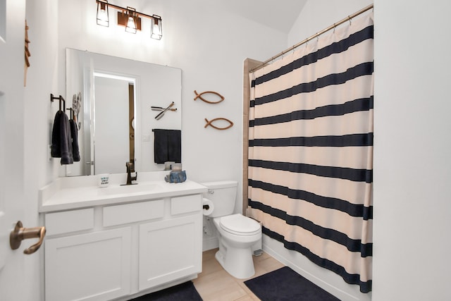 bathroom with vanity, toilet, tile patterned floors, and a shower with shower curtain