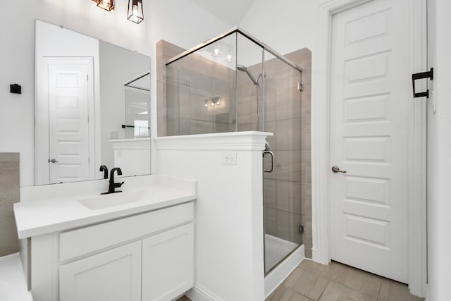 bathroom featuring vanity and walk in shower